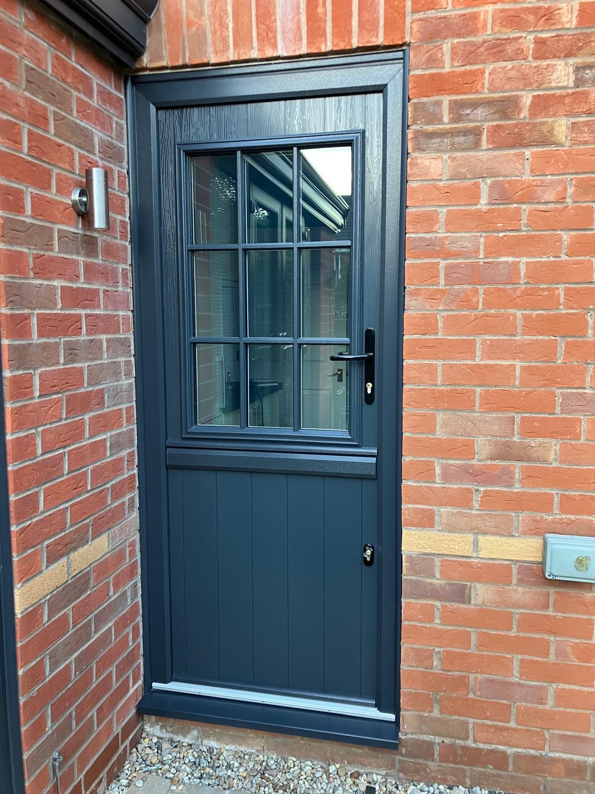 Anthracite stable door with glazed upper panel